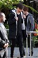 louis tomlinson steps out of hotel after sons birth 05