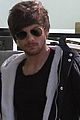 louis tomlinson steps out of hotel after sons birth 06