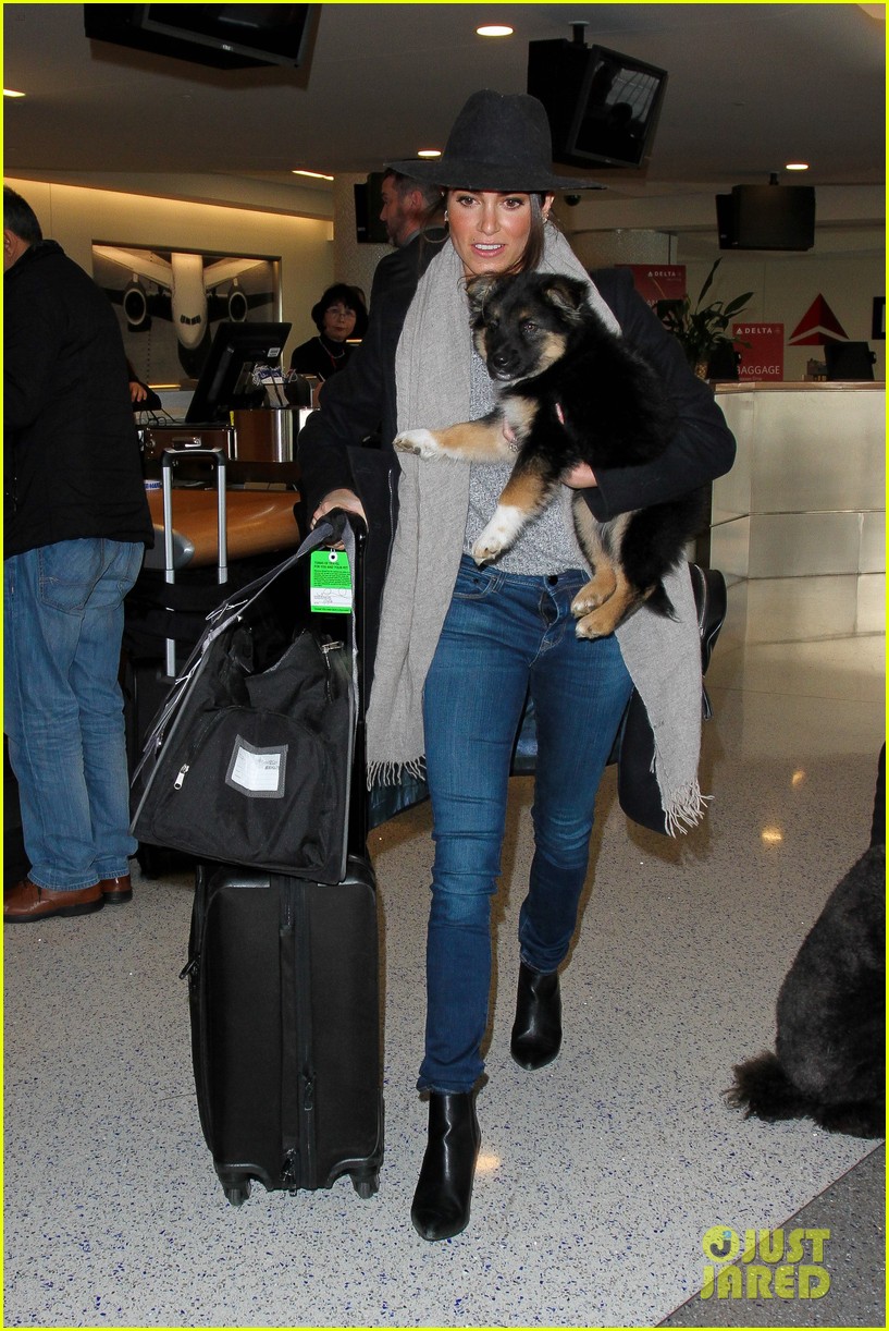 nikki reed flies with dog new owners lax 13