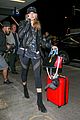 hailey baldwin pushes red carry on thru lax 07