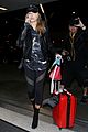 hailey baldwin pushes red carry on thru lax 21