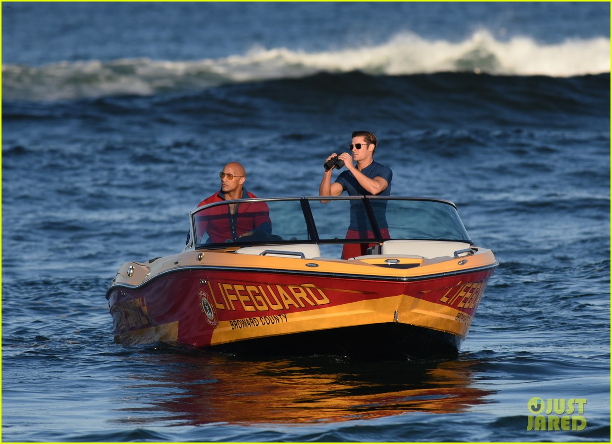 zac efron is having difficulty with swimming in the ocean 06