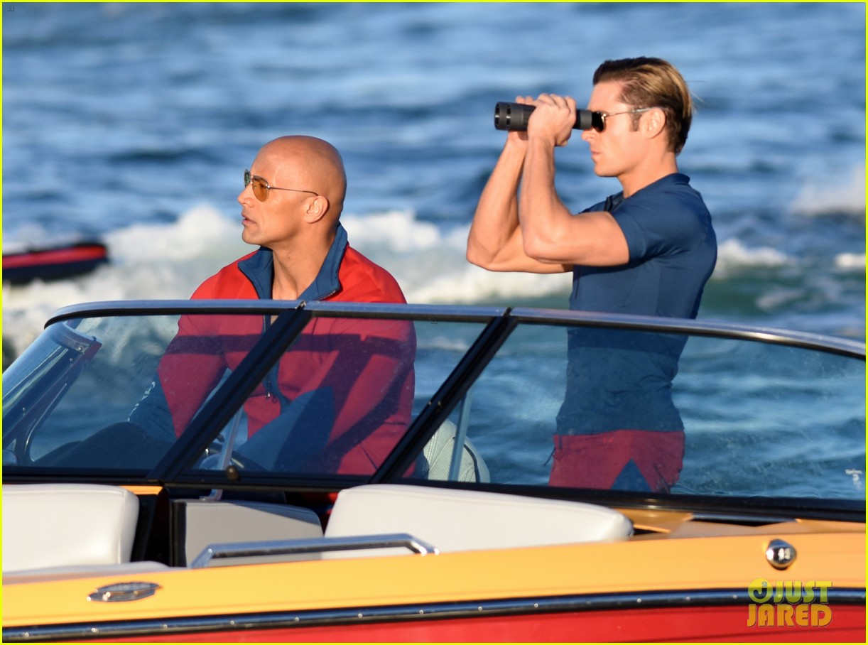 zac efron is having difficulty with swimming in the ocean 17