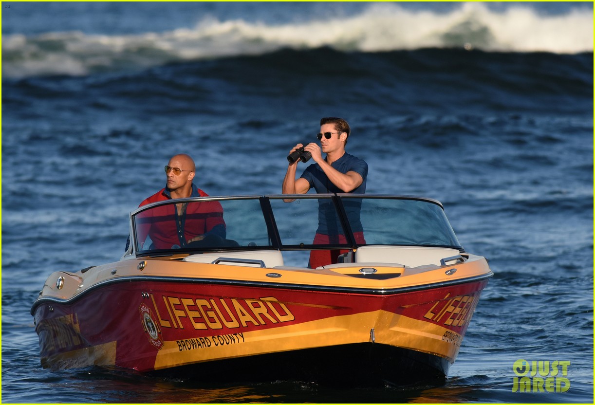 zac efron is having difficulty with swimming in the ocean 39