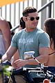 zac efron films baywatch on motorcycle 02