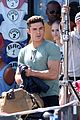 zac efron films baywatch on motorcycle 16