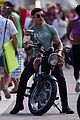 zac efron films baywatch on motorcycle 25