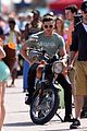 zac efron films baywatch on motorcycle 32