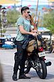 zac efron films baywatch on motorcycle 49