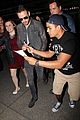 liam payne is bombareded by fans at airport 07