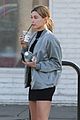 hailey baldwin holds sips on her coffee with her friend 06