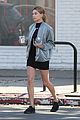 hailey baldwin holds sips on her coffee with her friend 10