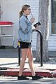 hailey baldwin holds sips on her coffee with her friend 11