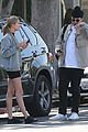 hailey baldwin holds sips on her coffee with her friend 13
