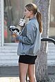 hailey baldwin holds sips on her coffee with her friend 14