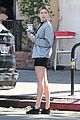 hailey baldwin holds sips on her coffee with her friend 16