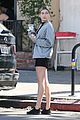 hailey baldwin holds sips on her coffee with her friend 18