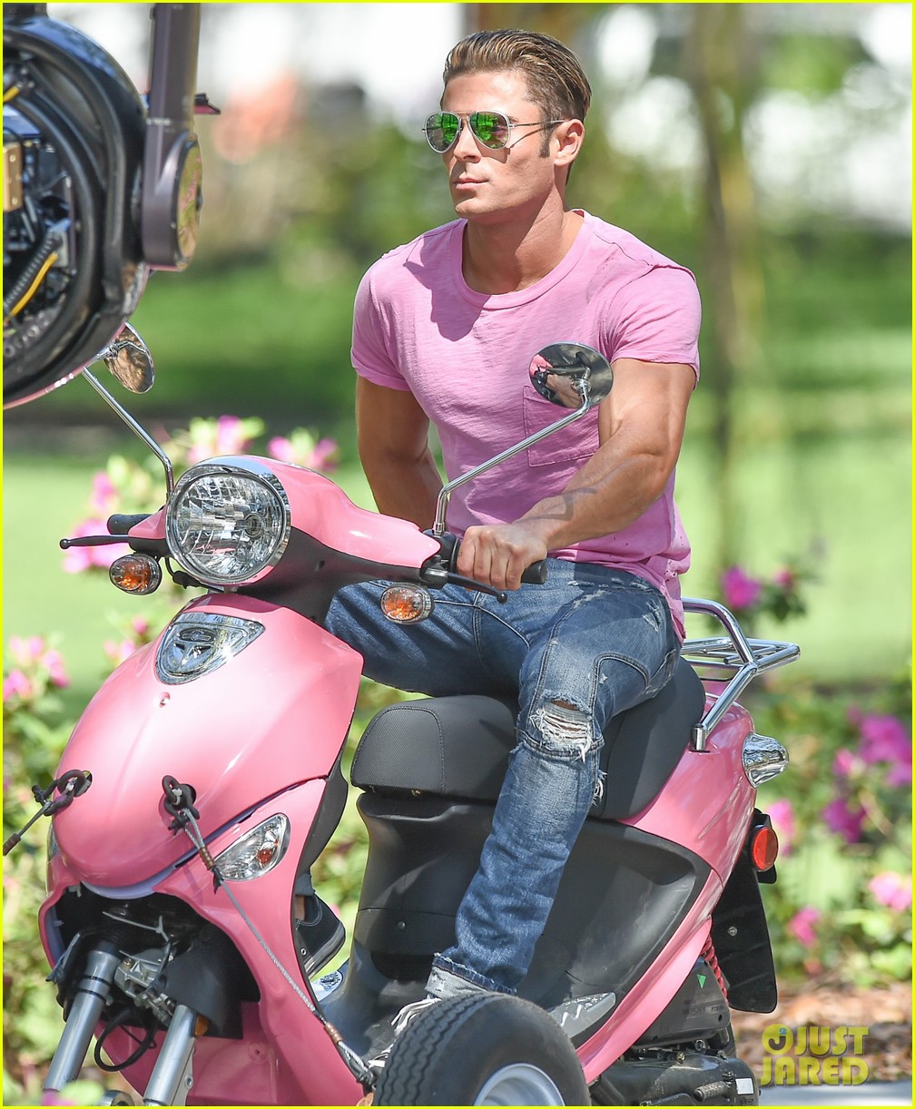 zac efron the rock film baywatch on a scooter 01