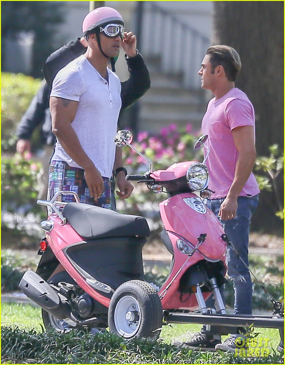 zac efron the rock film baywatch on a scooter 13