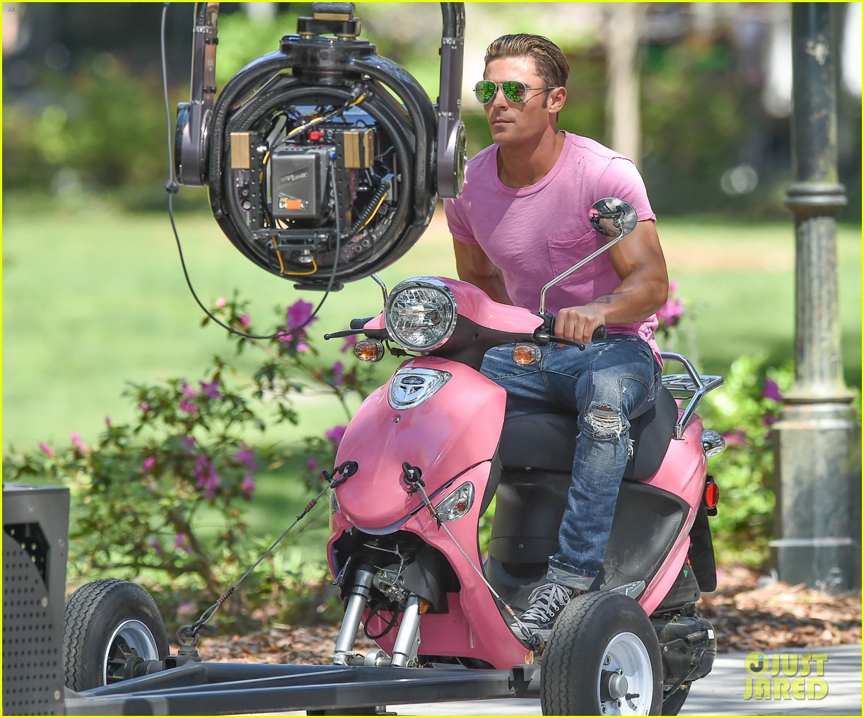 zac efron the rock film baywatch on a scooter 21