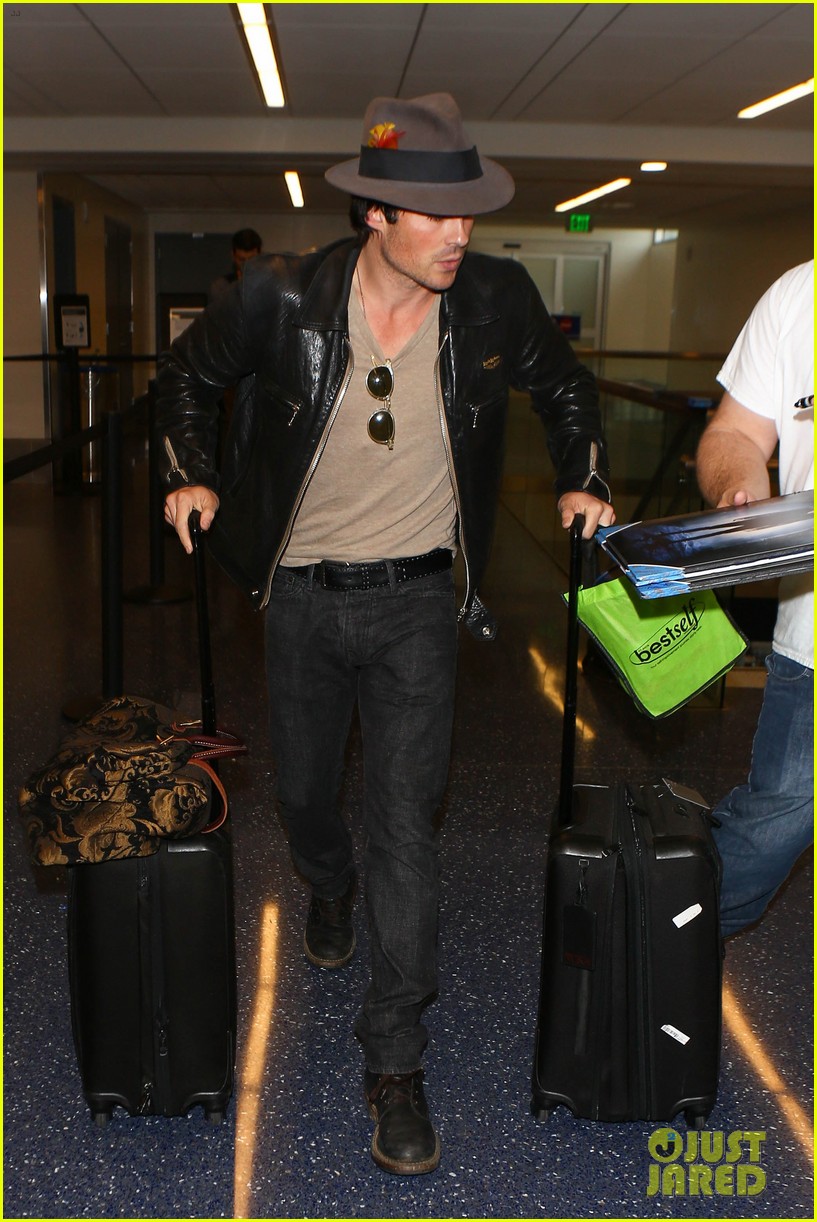 ian somerhalder nikki reed fly out lax after oscars 06