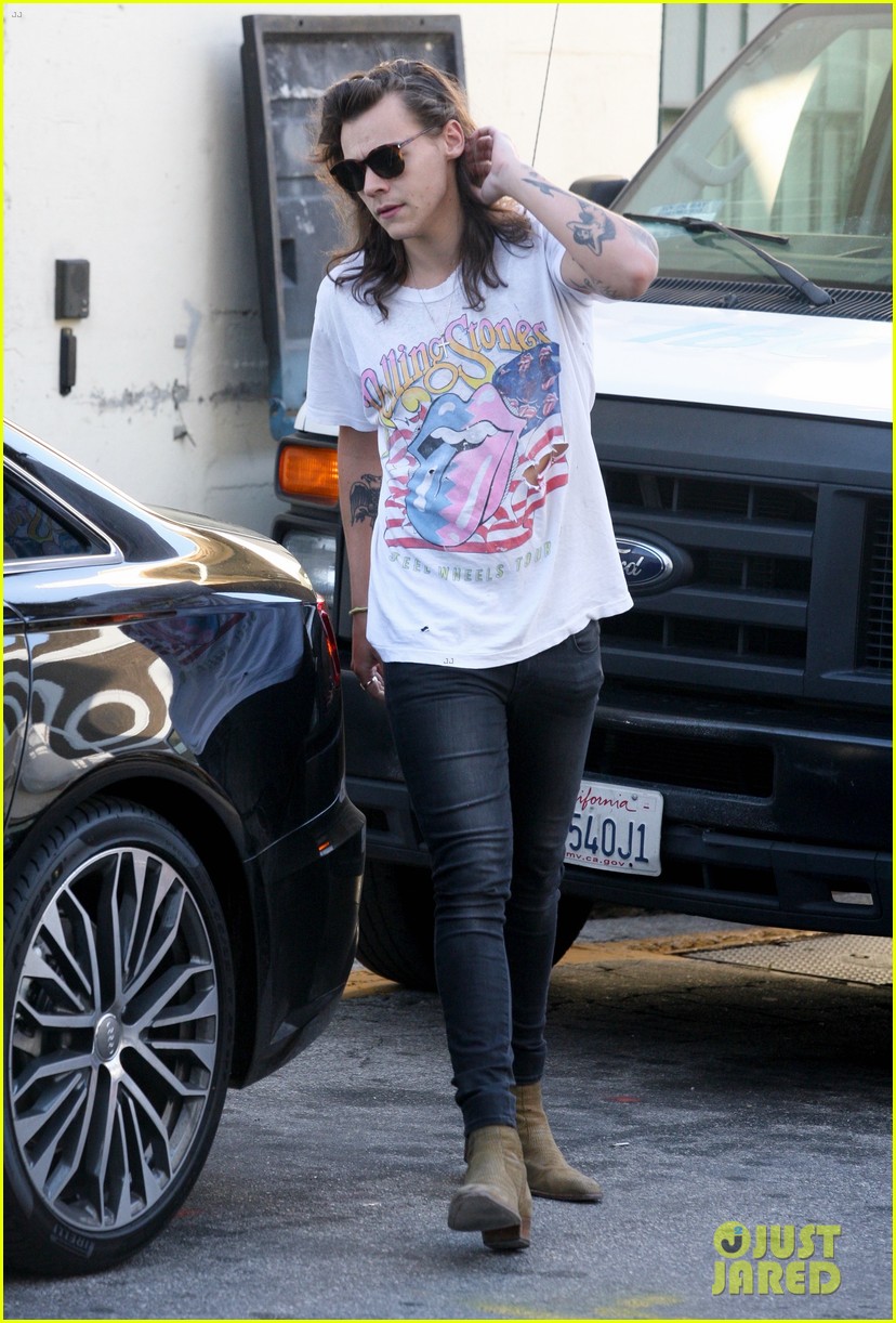harry styles sports vintage style while shopping at saint laurent 08