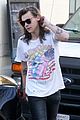 harry styles sports vintage style while shopping at saint laurent 02
