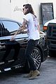harry styles sports vintage style while shopping at saint laurent 22