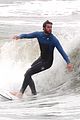 liam hemsworth strips out of his wetsuit after a surfing session 20