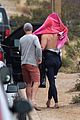 liam hemsworth strips out of his wetsuit after a surfing session 21