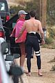 liam hemsworth strips out of his wetsuit after a surfing session 24
