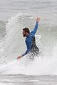 liam hemsworth strips out of his wetsuit after a surfing session 28
