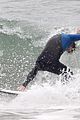 liam hemsworth strips out of his wetsuit after a surfing session 36