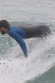 liam hemsworth strips out of his wetsuit after a surfing session 37