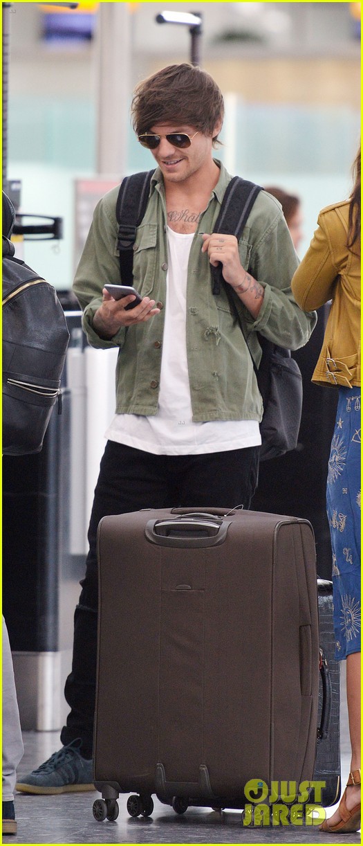 louis tomlinson danielle campbell heathrow airport after wedding 27