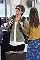 louis tomlinson danielle campbell heathrow airport after wedding 11