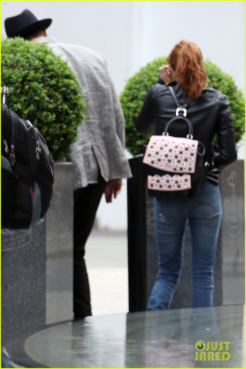 emma roberts embraces a mystery man in london 21