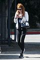 emma roberts embraces a mystery man in london 18