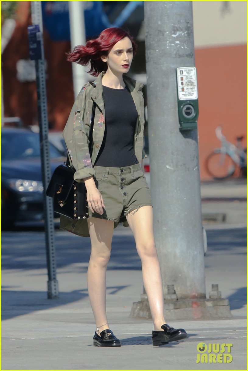 lily collins matches her red lipstick to her new red hair 05