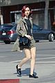 lily collins matches her red lipstick to her new red hair 03