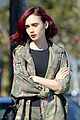 lily collins matches her red lipstick to her new red hair 04