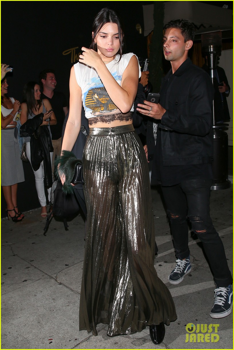gigi hadid kendall jenner match in rock band crop tops 12