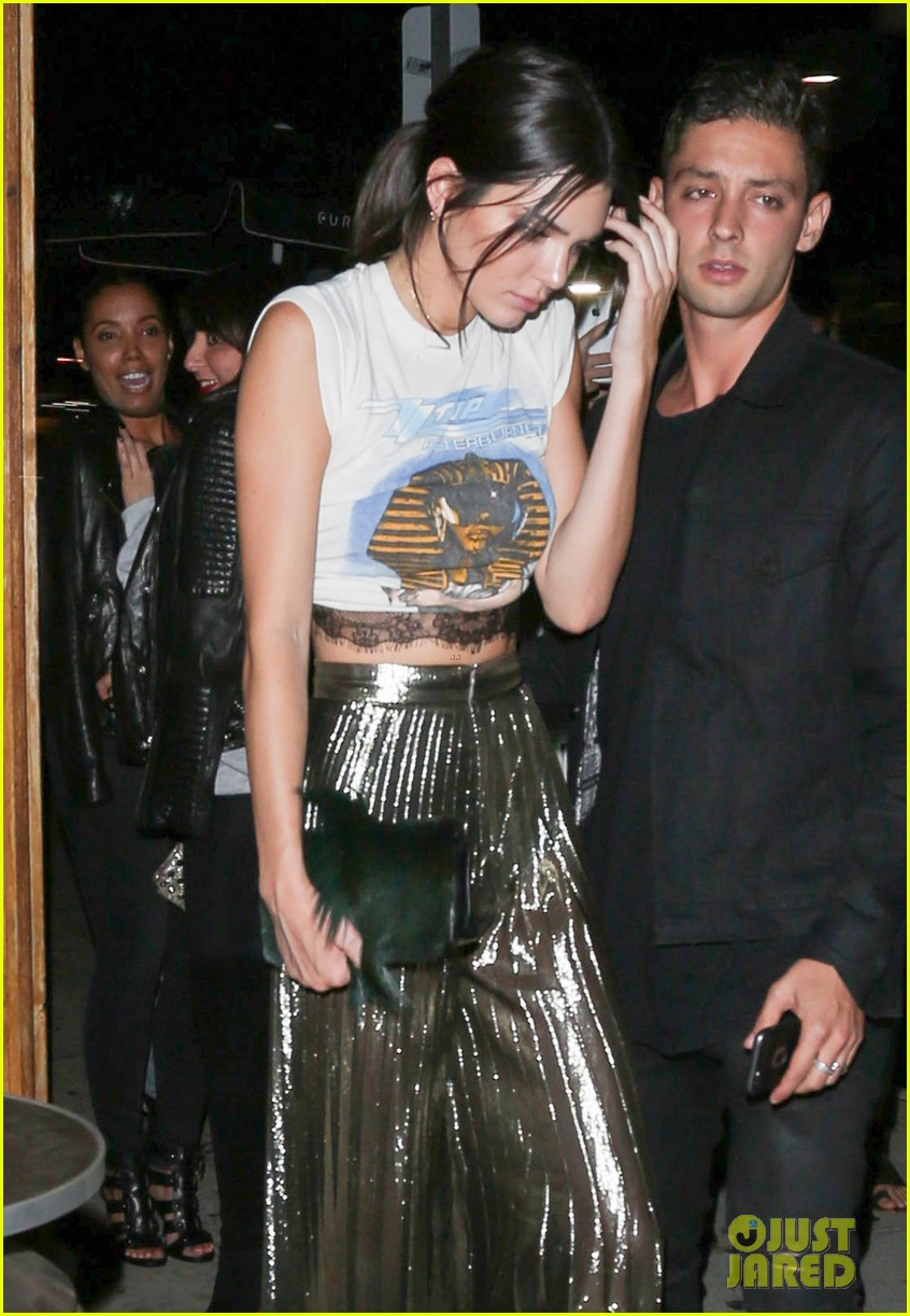 gigi hadid kendall jenner match in rock band crop tops 24