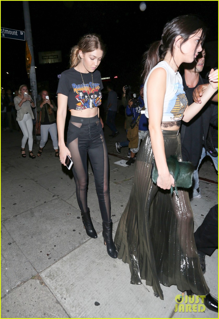 gigi hadid kendall jenner match in rock band crop tops 25