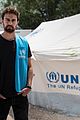 theo james heads to greece for world refugee day 02