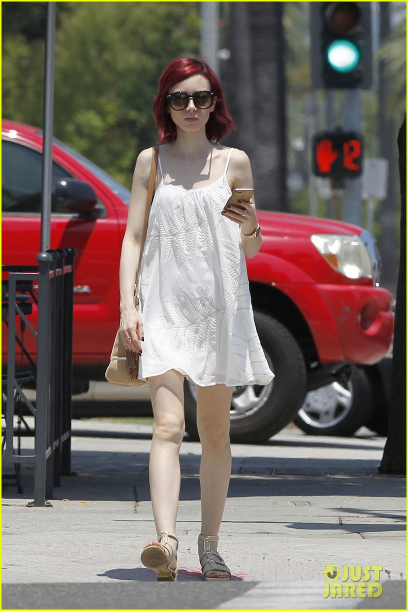 lily collins strikes a pose in last tycoon picture 06