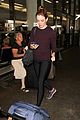 danielle panabaker hides engagement ring lax airport 03
