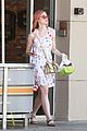 elle fanning debuts new pink hair color 01