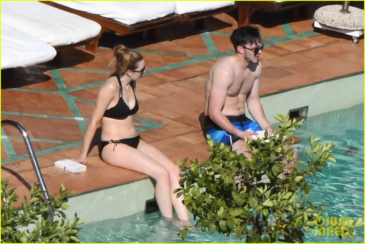 nicholas hoult shirtless by the pool 16