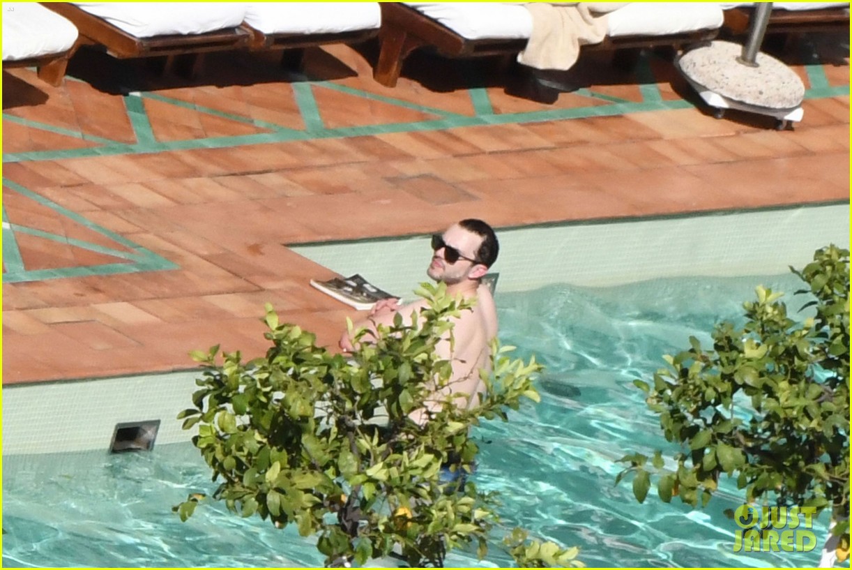 nicholas hoult shirtless by the pool 19